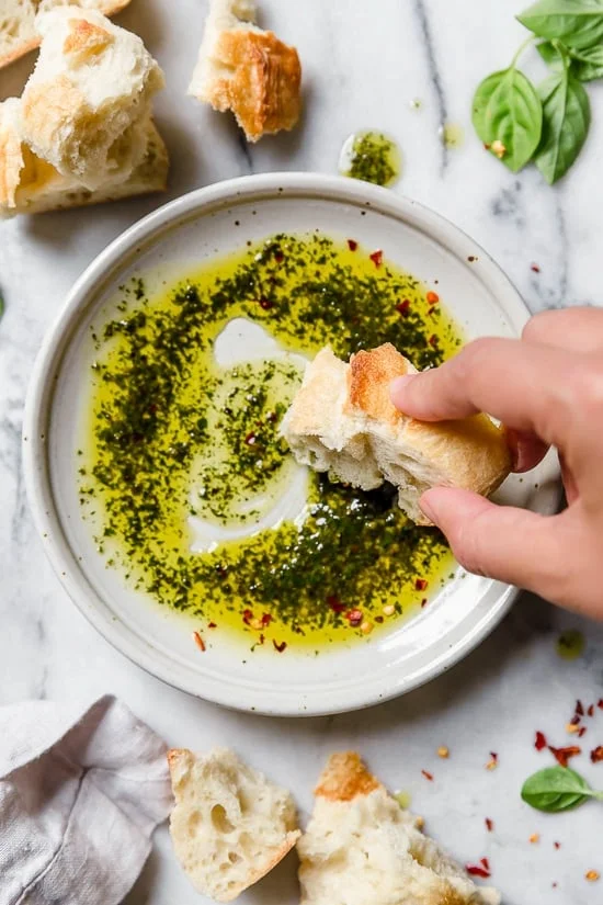 Making basil oil is so simple and the end result is so amazing, trust me you’ll want to drizzle it all over your chicken, fish, tomatoes, vegetables or just eat it with some crusty bread! 