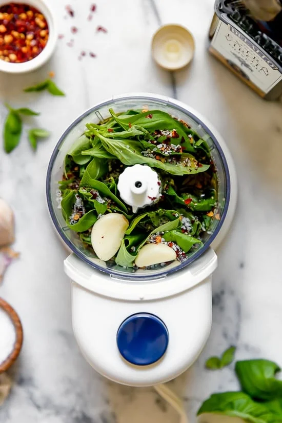 Making basil oil is so simple and the end result is so amazing, trust me you’ll want to drizzle it all over your chicken, fish, tomatoes, vegetables or just eat it with some crusty bread! 