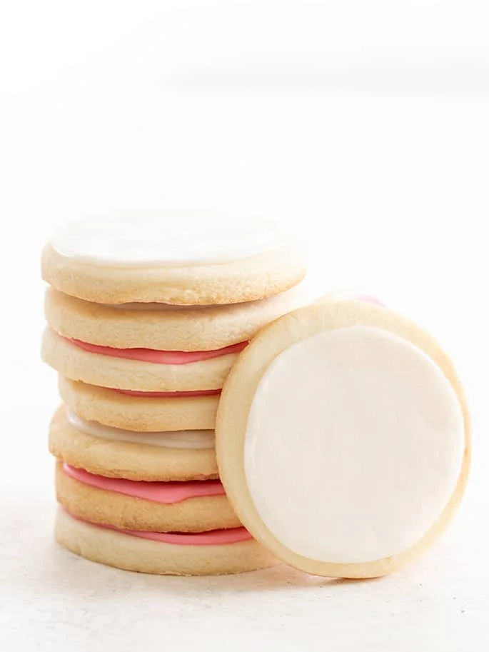 Meltaway cutout cookies in a stack with one on its side