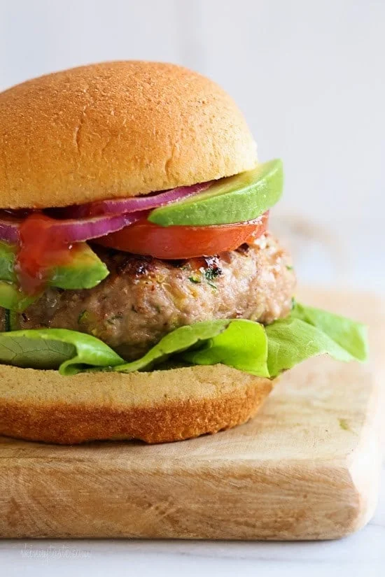 My trick to making the juiciest turkey burgers EVER is by adding grated zucchini! A huge bonus if you want your kids to eat more veggies – they'll never know!