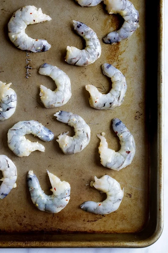 One of the quickest and easiest ways to prepare shrimp is to roast them in the oven and simply drizzle with some olive oil, garlic and fresh lemon juice.