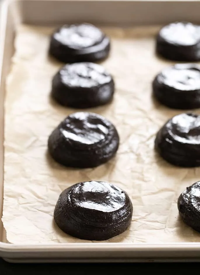 Oreo Cakesters cookie dough on brown surface.
