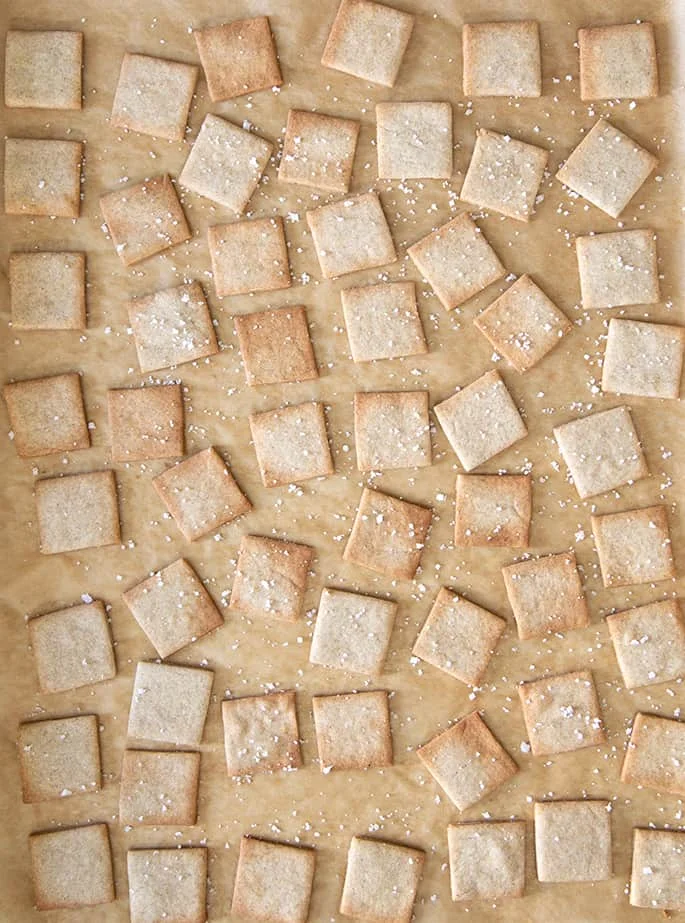 Overhead image of baked gluten free wheat thins style crackers
