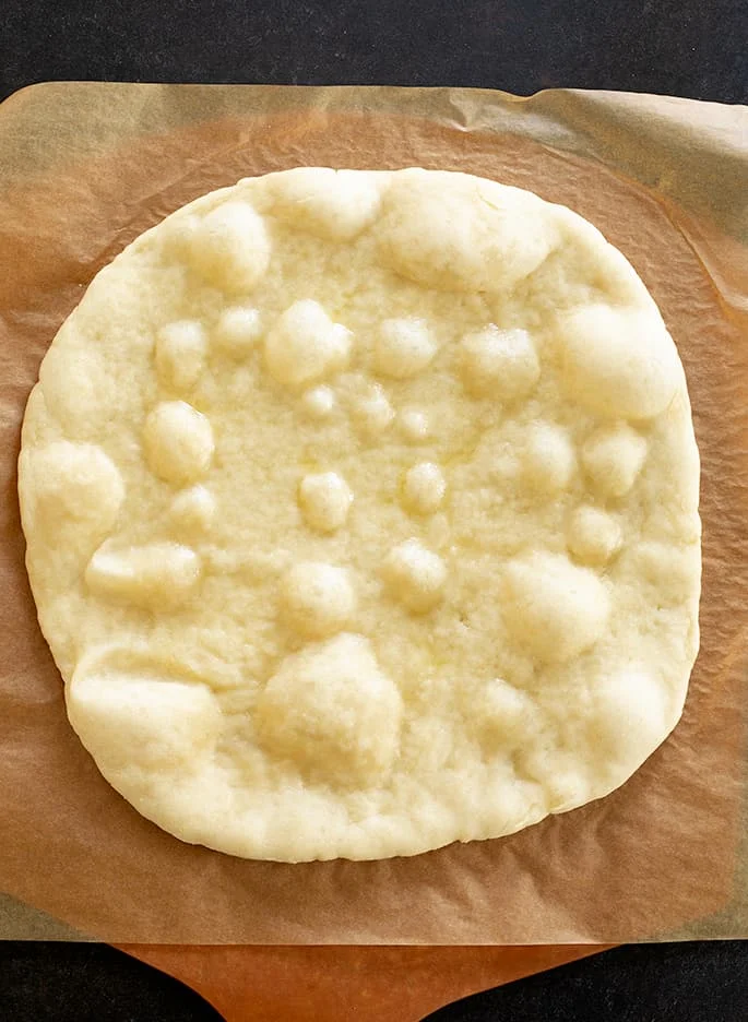 Overhead image of parbaked gluten free pizza without toppings