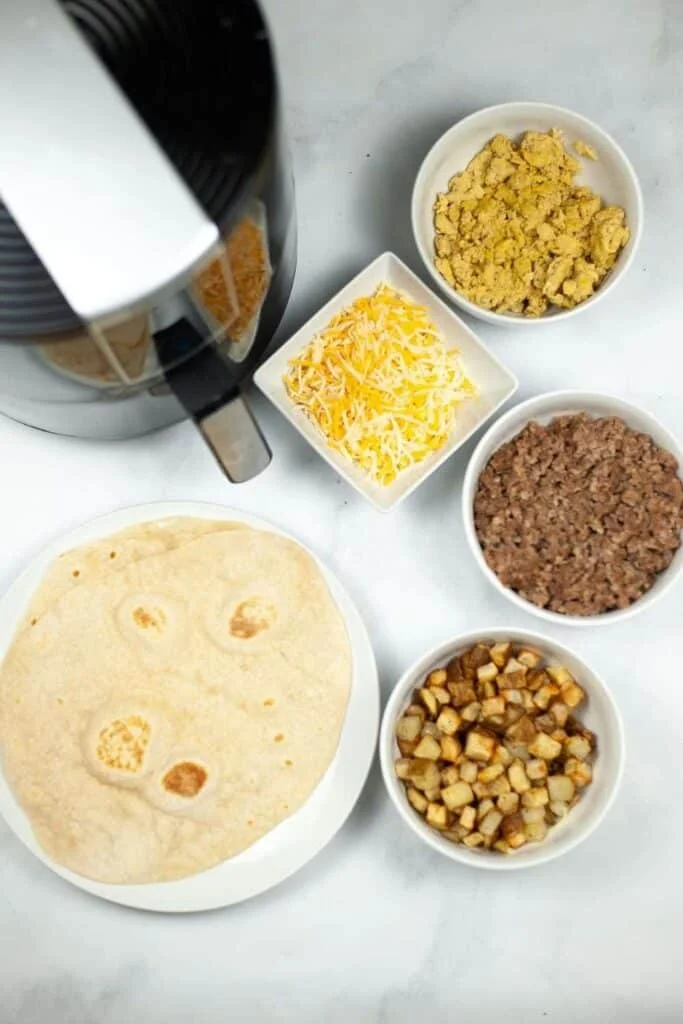Overhead photo of each ingredient in recipe with the air fryer as well