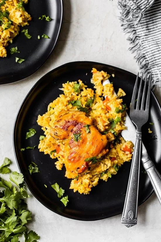 Overhead view of Arroz con Pollo served on a plate.