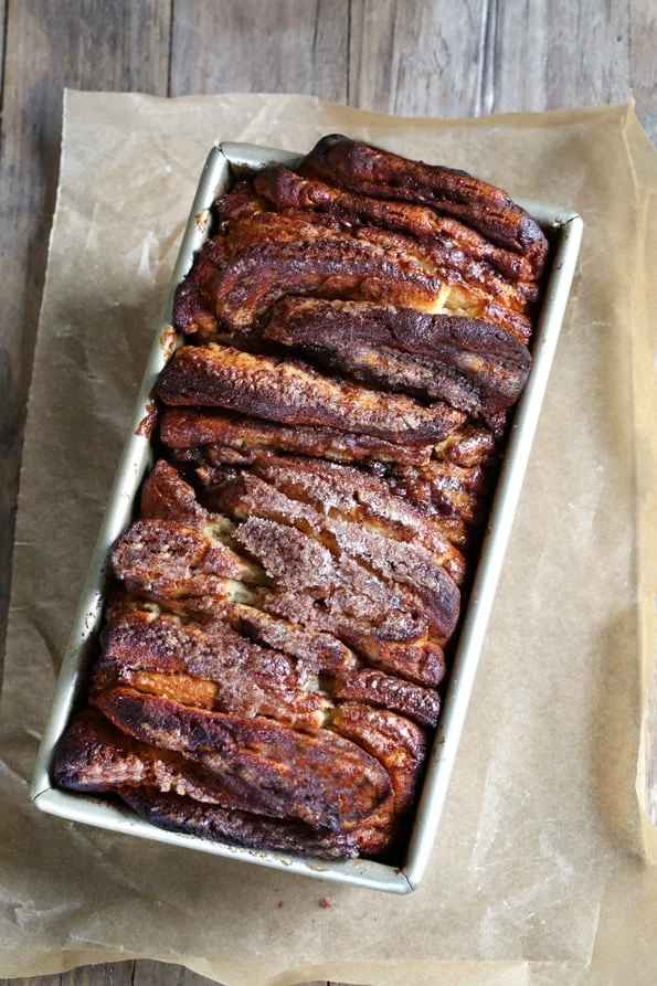 Overhead view of chocolate pull apart bread in a metal loaf pan
