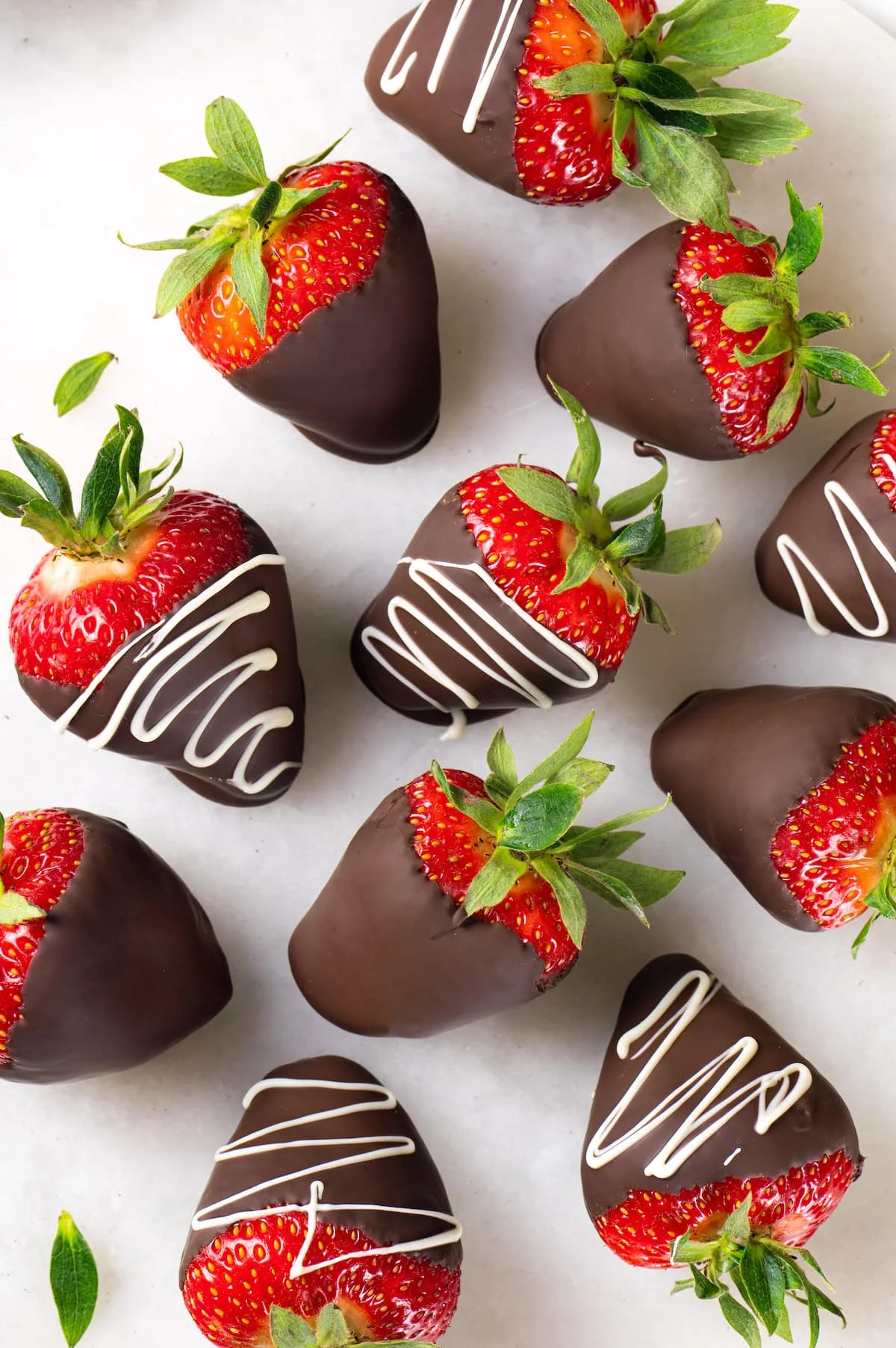 Overhead view of chocolate strawberries on countertop