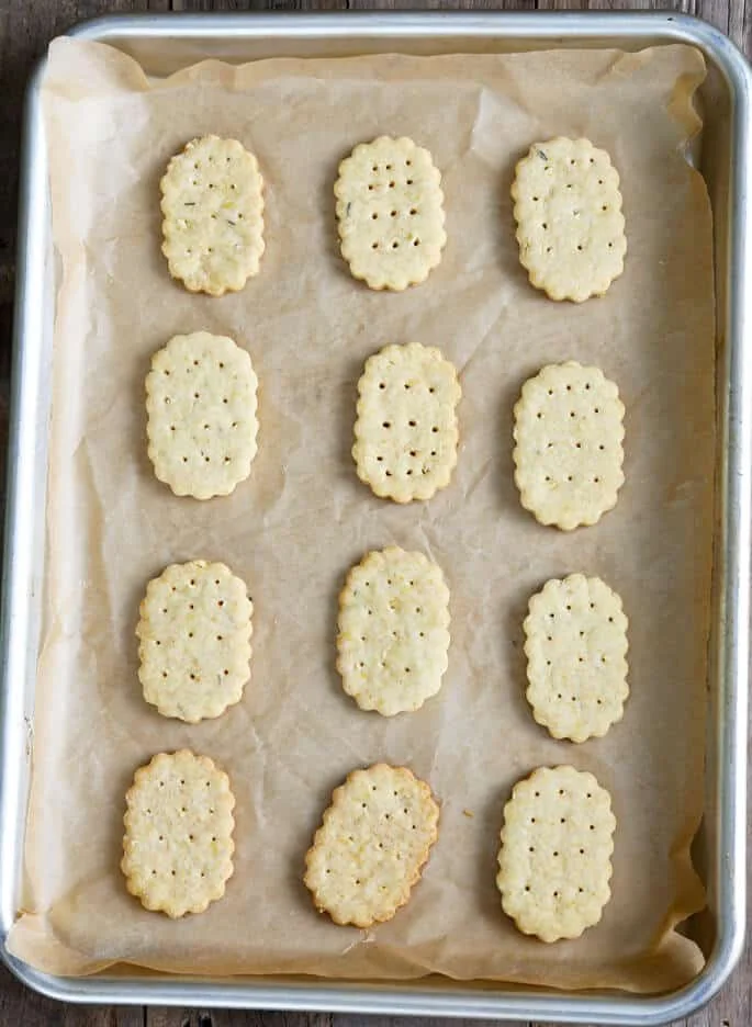 Overhead view of crackers on beige paper