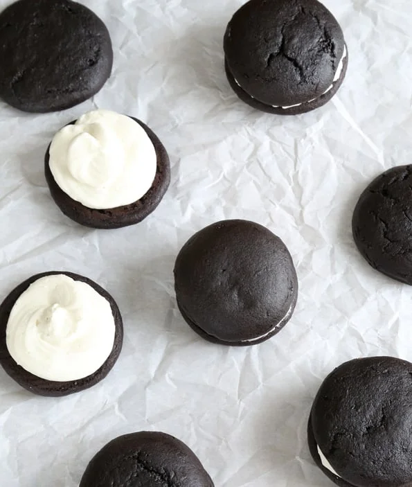 Overhead view of Oreo Cakesters on white surface. 