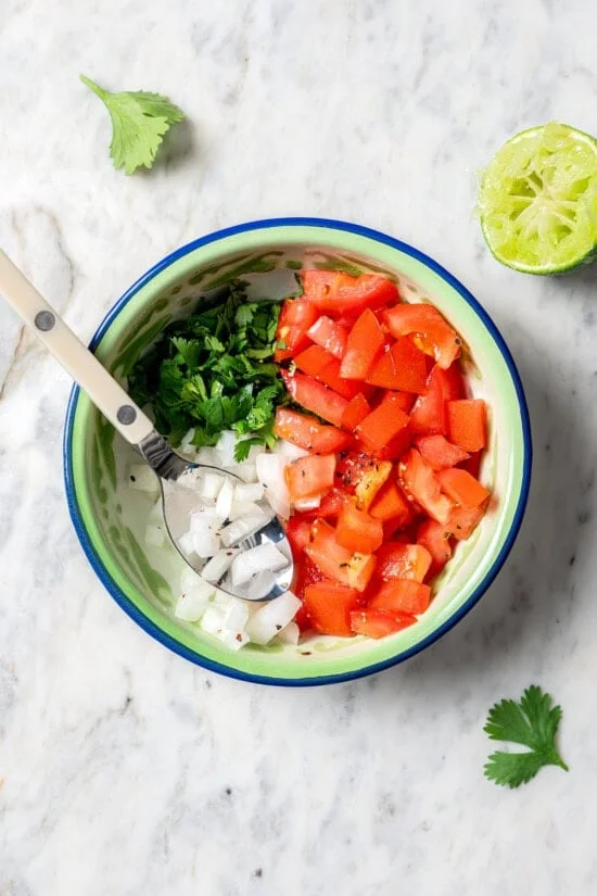 Pico de gallo ingredients in bowl