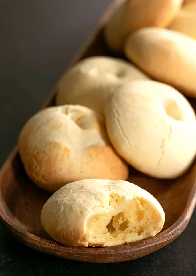 Pile of freshly baked cheese bread.