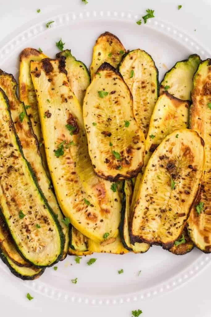 pile of slices of squash cooked in air fryer