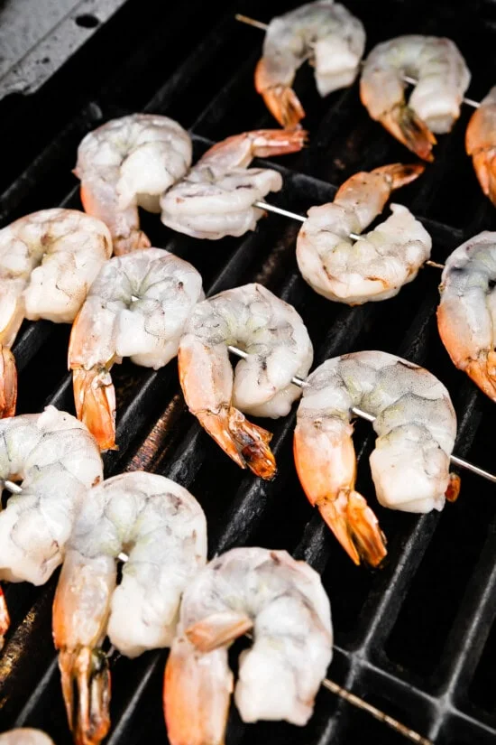 Place on skewers and preheat the grill.
