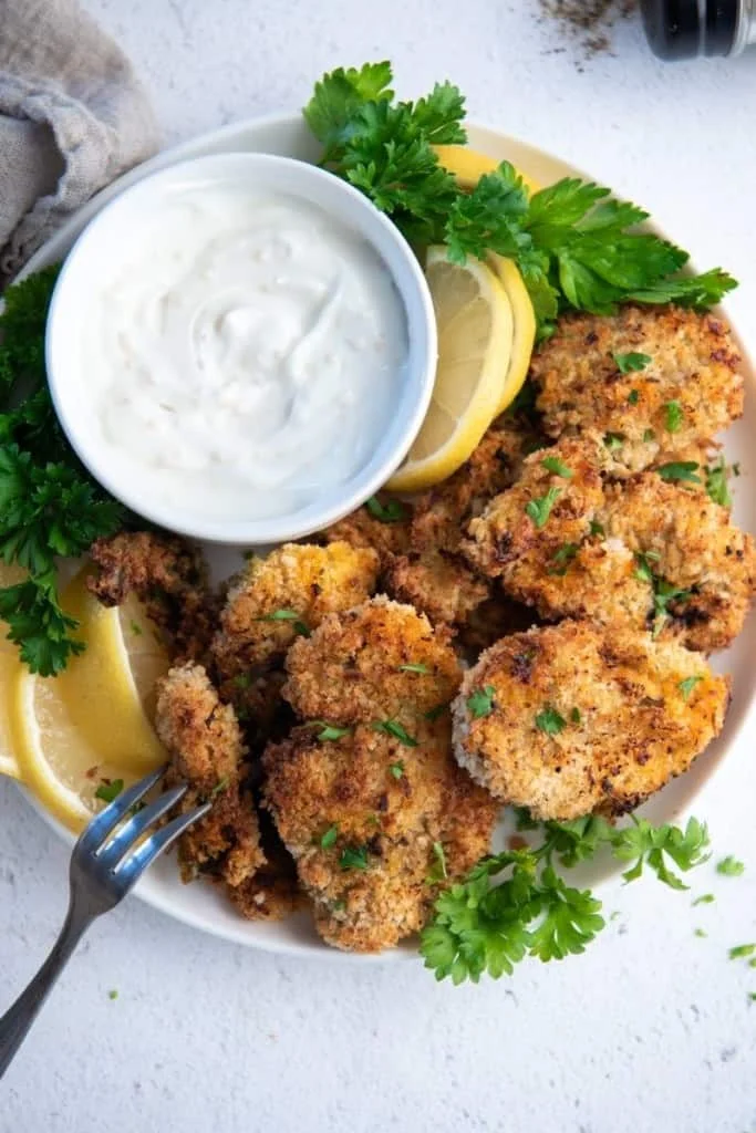 plate with oysters and dipping sauce