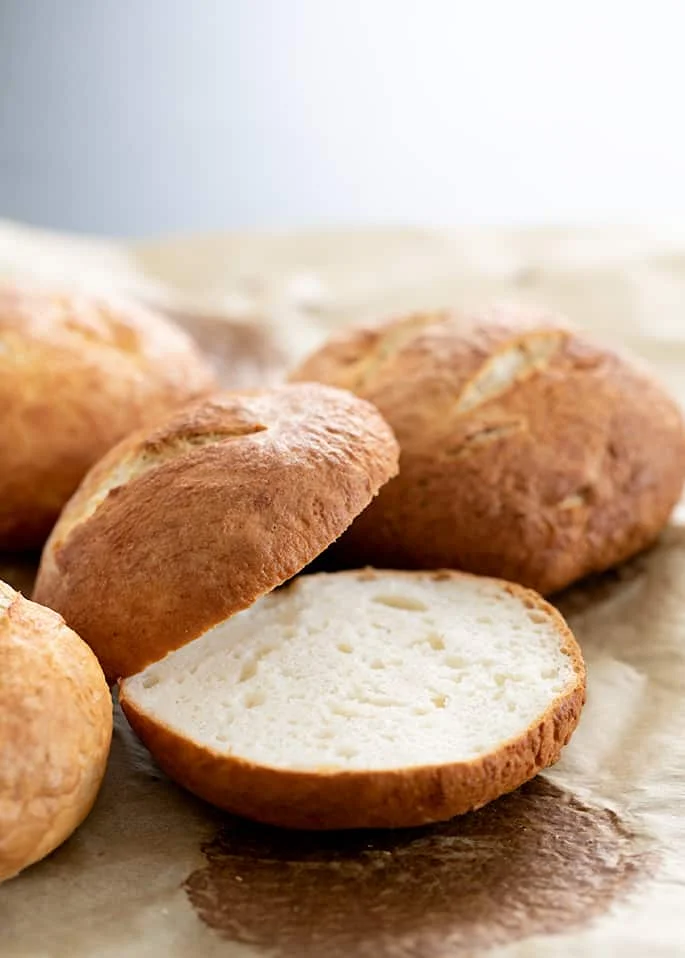 Pretzel rolls cut in half showing inside
