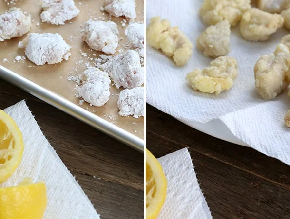 Raw lemon chicken on beige and white surface 