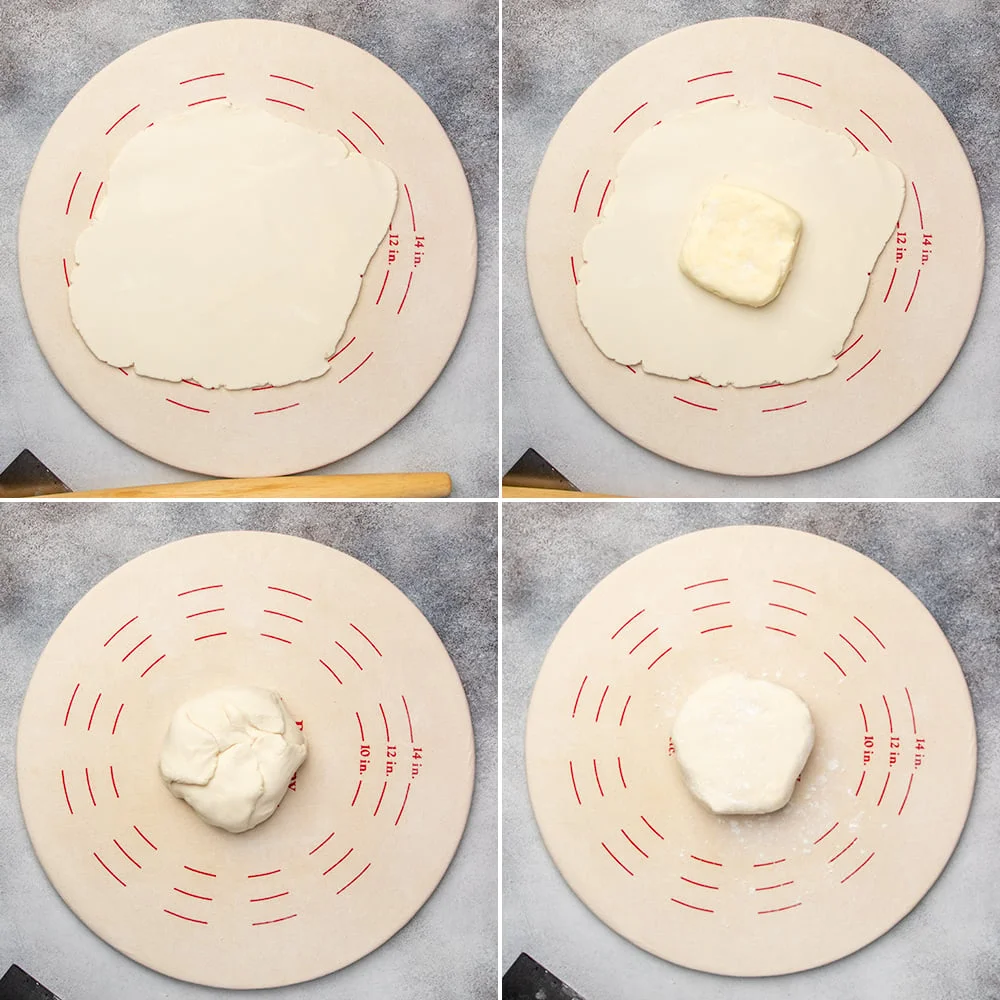 Rolled out dough with flat yellow butter square on top, and then dough wrapped around butter.