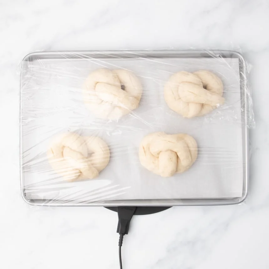 same 4 raw soft pretzels, now risen