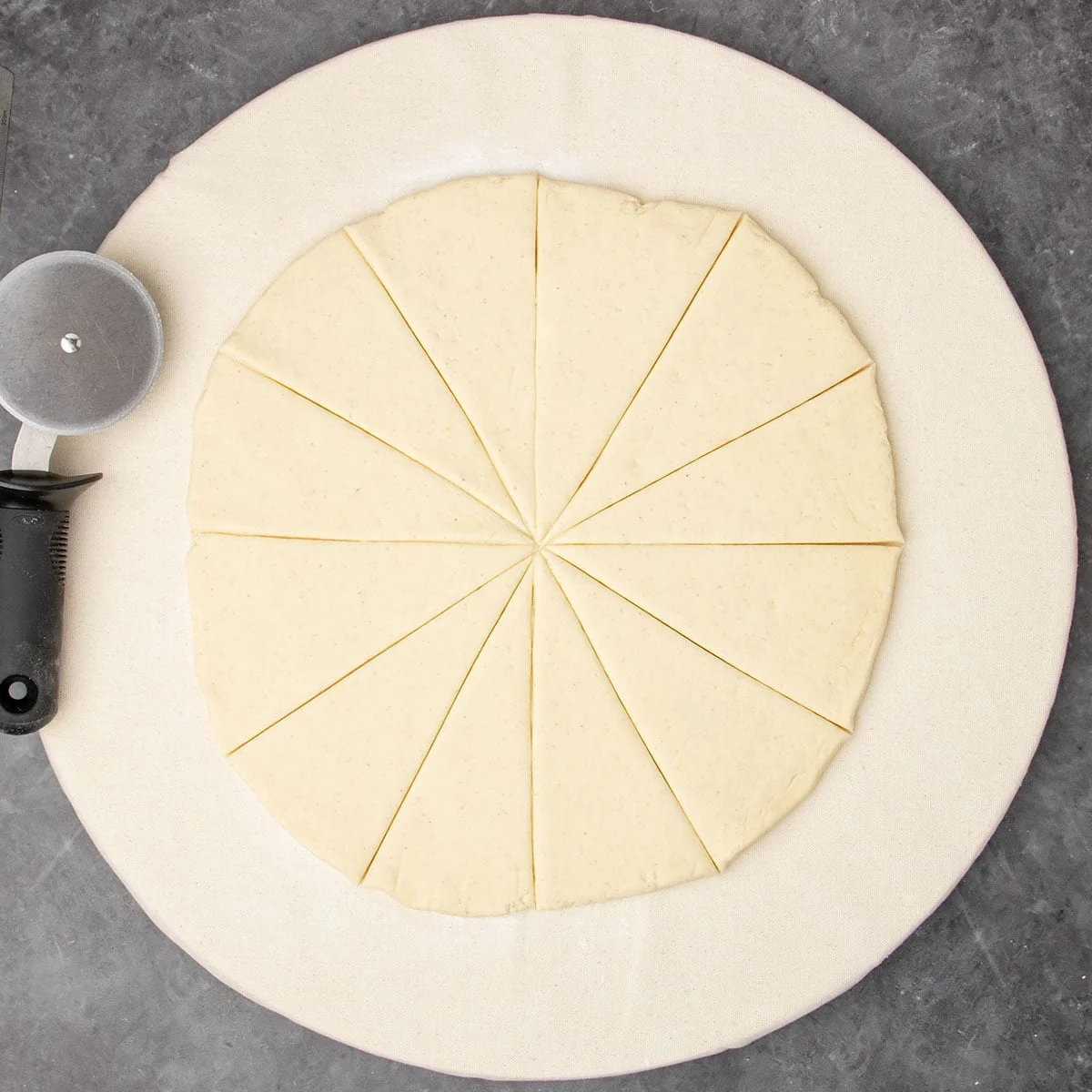 same dough now cut into 12 roughly equal triangles