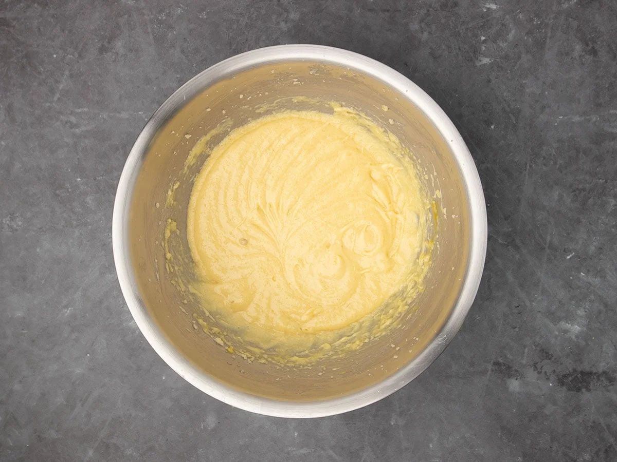 same mixture with eggs beaten in to a soft light yellow mixture