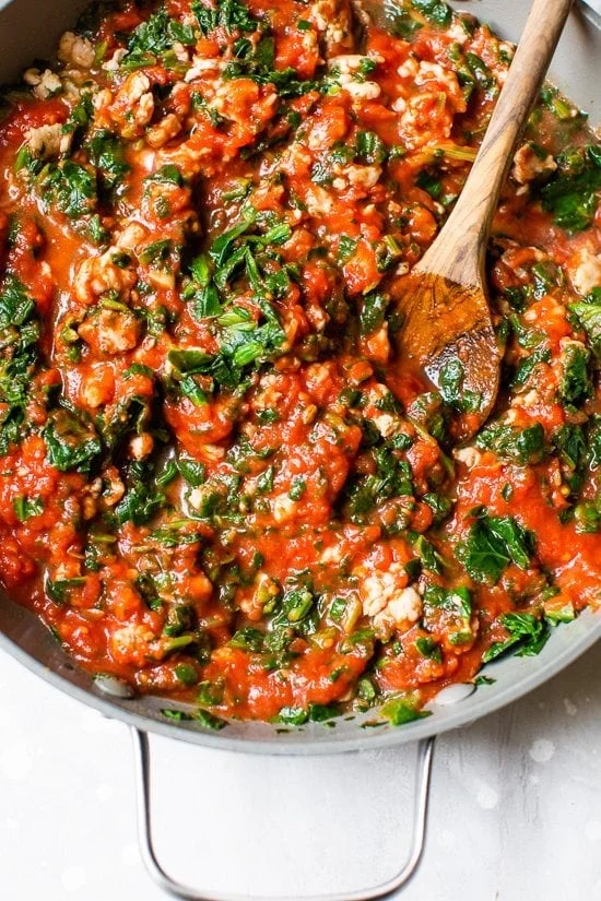 sauce with sausage and spinach