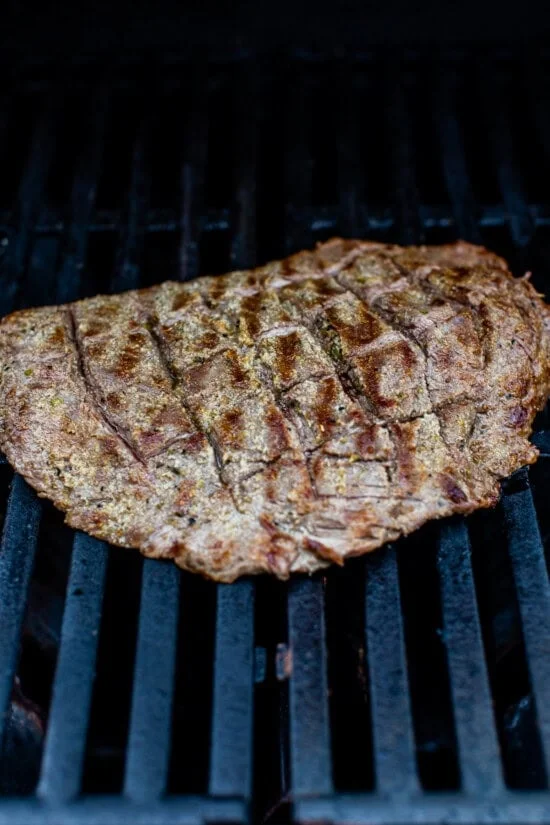 Season the steak and grill