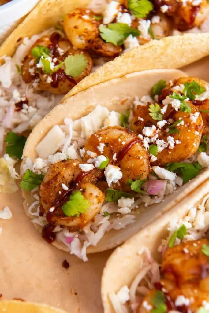 several shrimp tacos