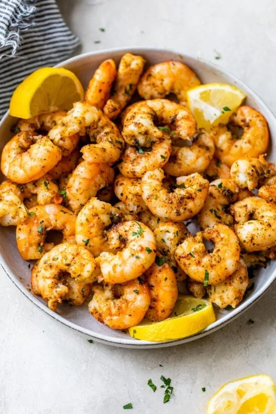 shrimp with lemon wedges