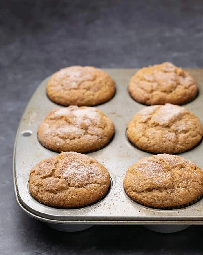 Six baked applesauce m uffins in metal tin