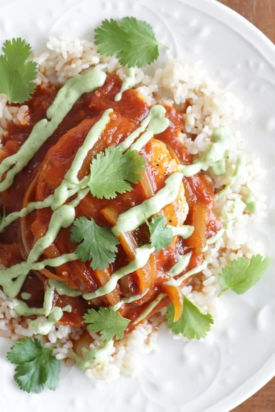 Skillet Chicken in Tomato-Chipotle Sauce with Avocado Crema