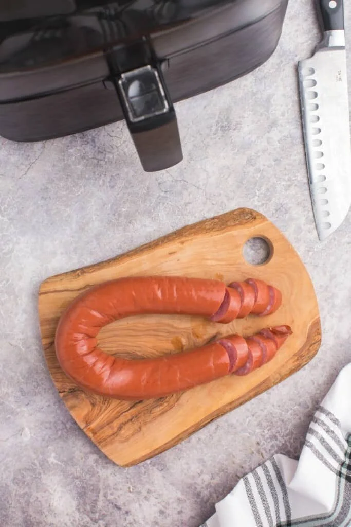 slicing up a whole kielbasa 