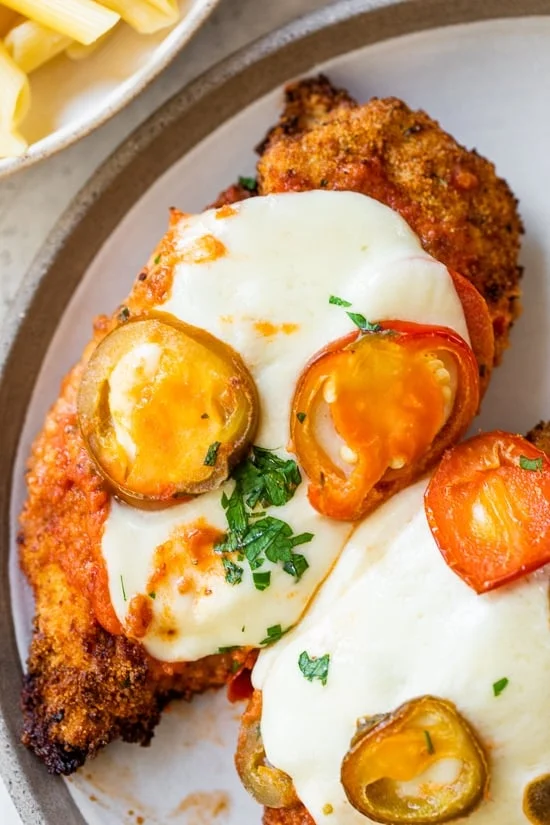Spicy Vodka Chicken Parmesan on a plate