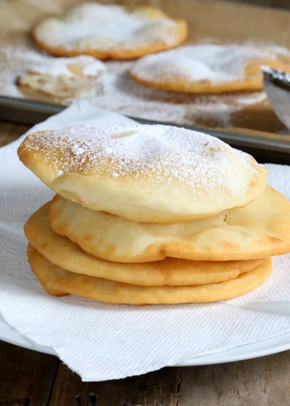 Stack of fry bread on white surface 
