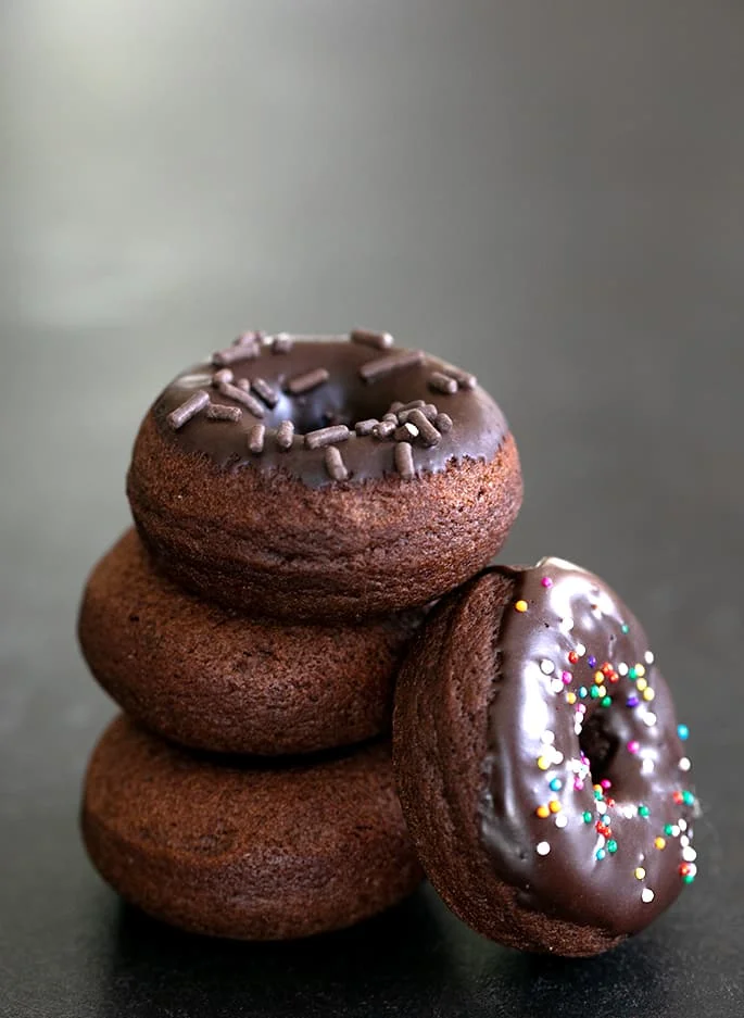 stack of gluten free chocolate cake donuts in a stack