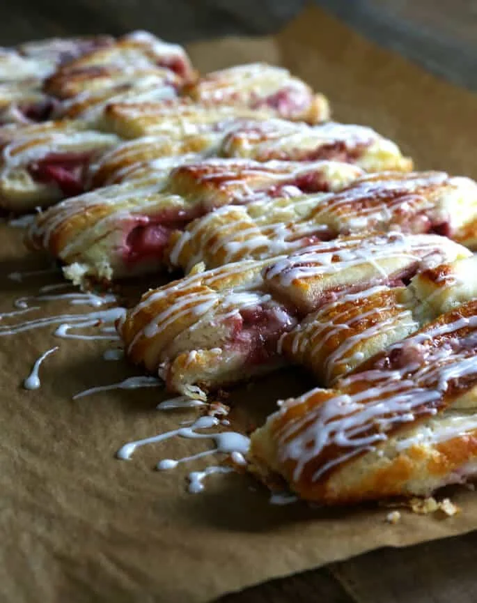 Strawberry danish bread on parchment paper