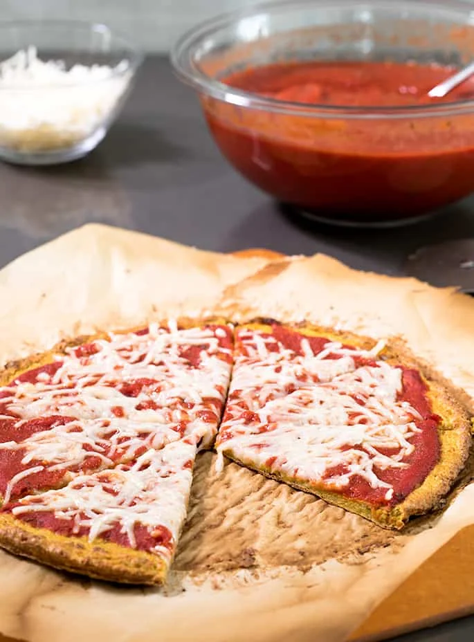 The pizza with a slice taken out.