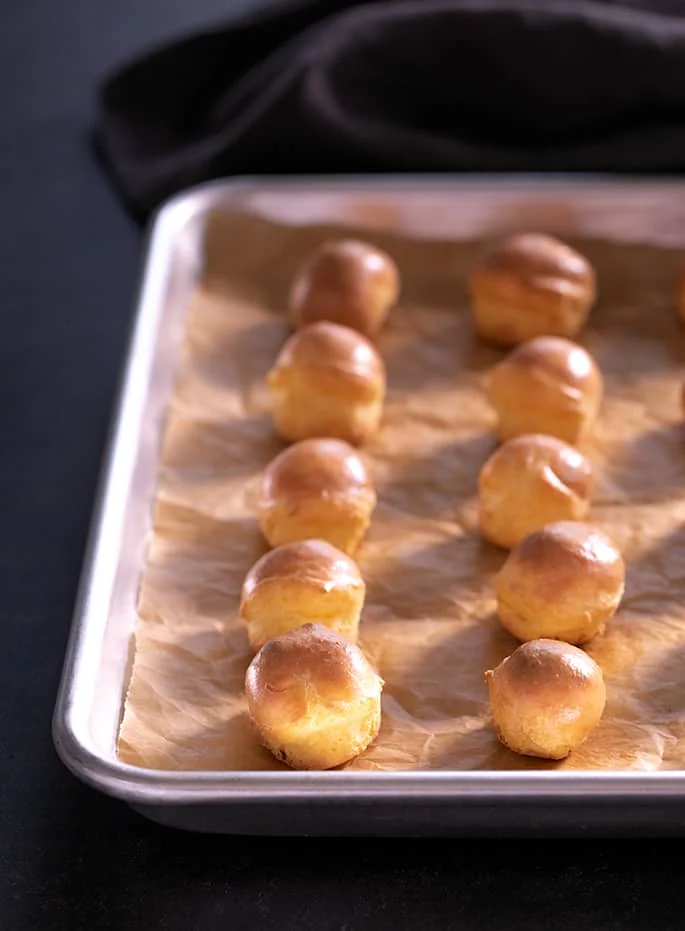 There are just 5 basic ingredients in these simple but fancy little cheese puffs with the funny French name, gougères. They'll never know they're gluten free unless you tell!