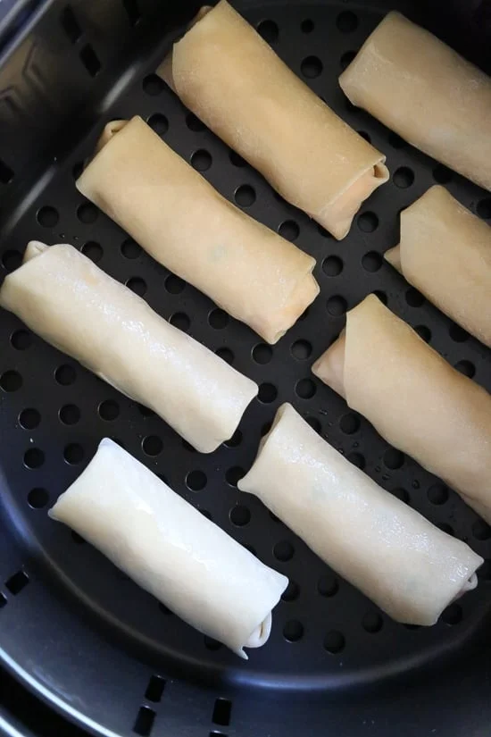 These Buffalo Chicken Egg Rolls, filled with shredded boneless chicken breast, hot sauce and blue cheese make the perfect appetizer! Bake them in the oven or air fryer!