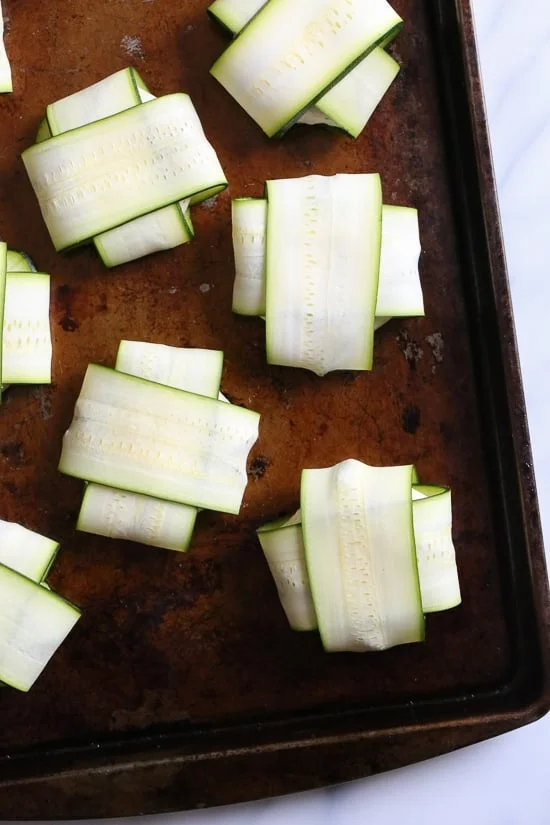 These low-carb pork dumplings, made with zucchini in place of dough are so dang good, you won't miss the carbs! They are also keto, paleo, gluten-free and whole30 friendly!