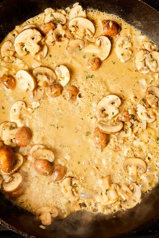 These Pork Chops with Mushrooms and Shallots are juicy and flavorful, perfect for weeknight dinner!