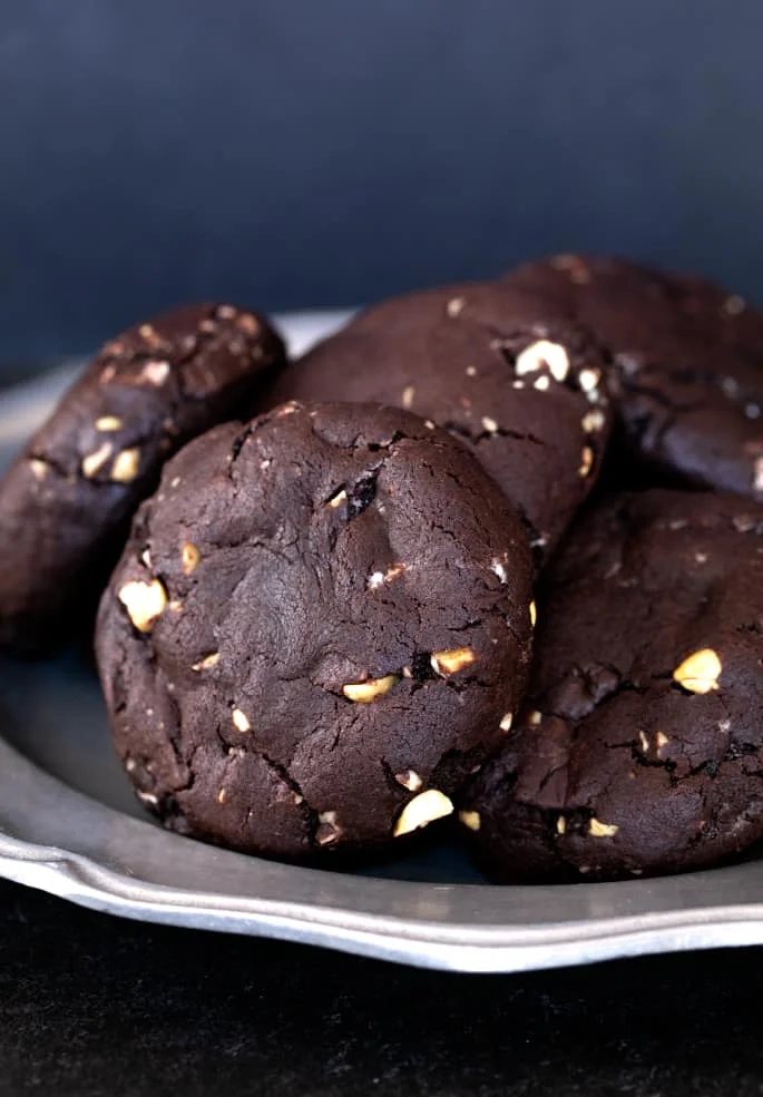 These super thick gluten free rocky road chocolate cookies are rich double chocolate chip cookies packed with nuts and marshmallows.