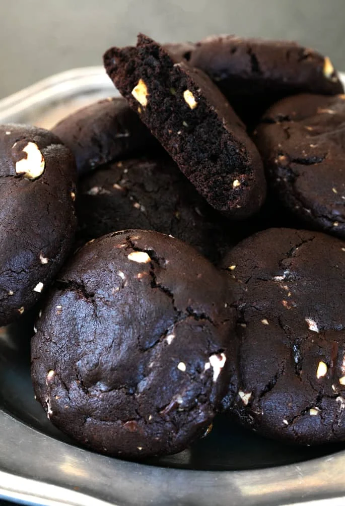 These super thick gluten free rocky road chocolate cookies are rich double chocolate chip cookies packed with nuts and marshmallows.
