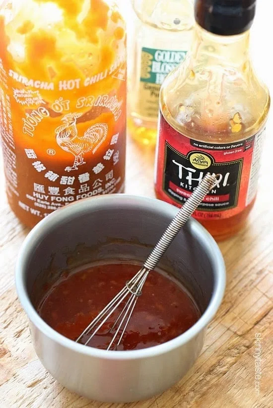 These sweet 'n spicy Asian glazed grilled drumsticks are finger licking good! An inexpensive, weeknight dish you'll want to make all summer long!