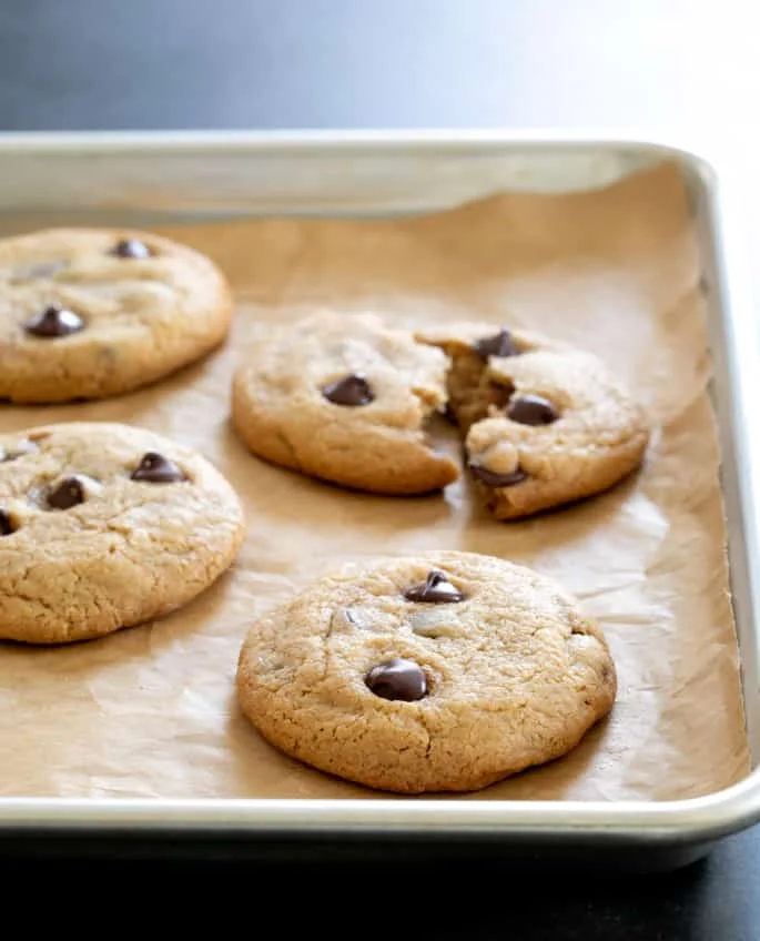 These thick and chewy gluten free peanut butter chocolate chip cookies are made with plenty of peanut butter and brown sugar. 