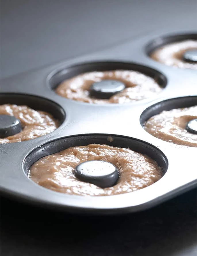 This easy gluten free apple cider donuts recipe is the cure for what ails you when you go to the apple orchard—but can't buy their sweet-smelling baked goods!