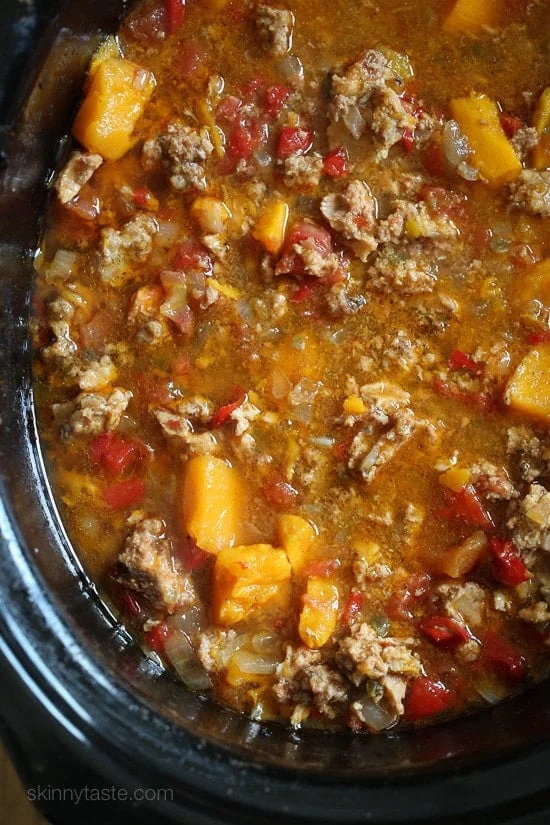 This easy Slow Cooker Paleo Jalapeno Popper Chicken Chili recipe is perfect for Fall, football games, and chili season!