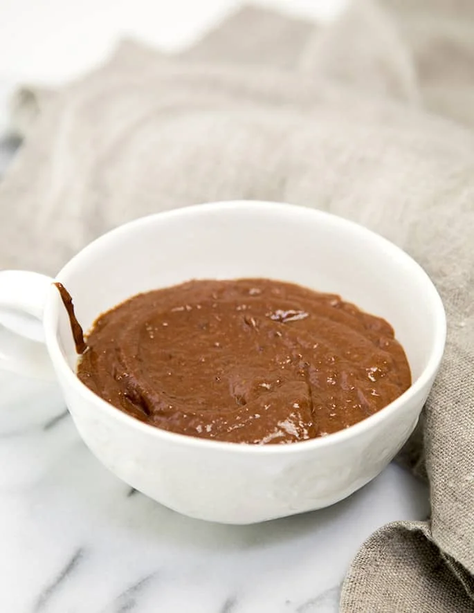 This flourless chocolate mug cake is rich and decadent enough for a single-serve dessert, and healthy enough to have for breakfast. 