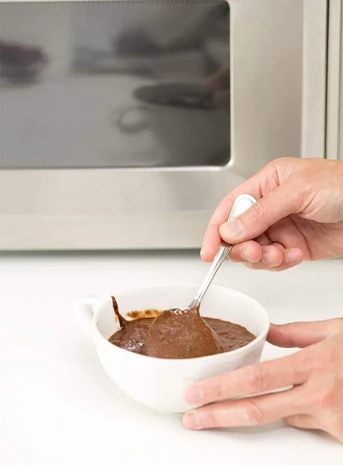 This flourless chocolate mug cake is rich and decadent enough for a single-serve dessert, and healthy enough to have for breakfast. 
