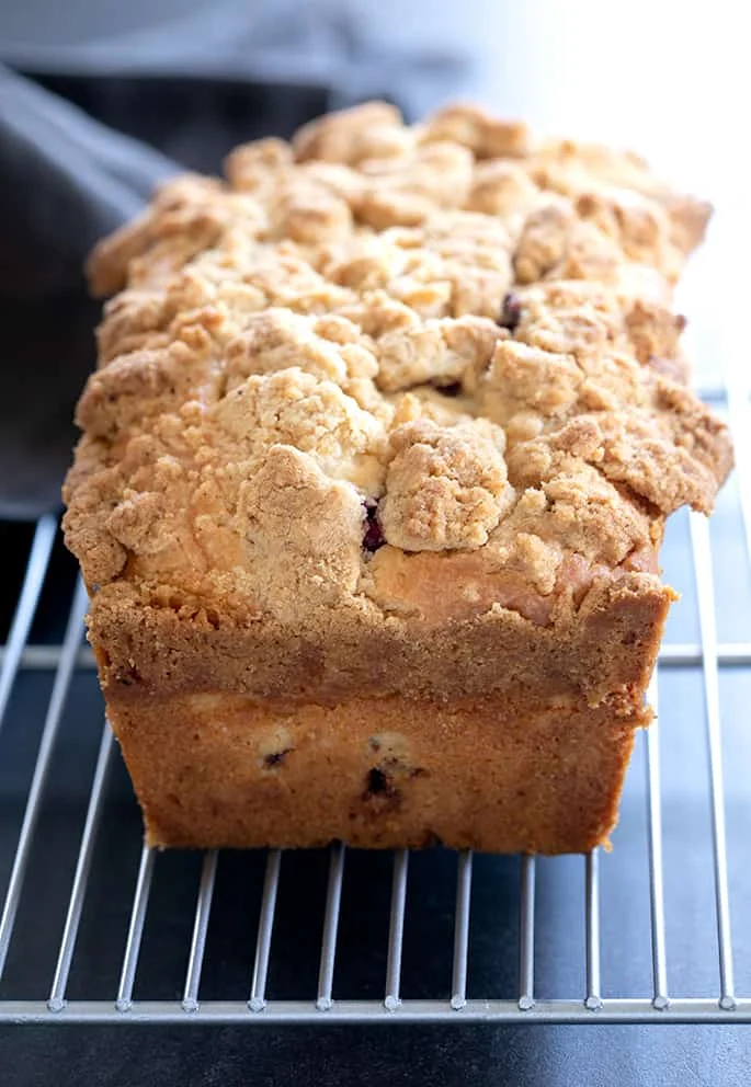 This gluten free blueberry muffin bread is a tender and rich quick bread made with sour cream, packed with fresh blueberries. Crumble topping (sort of) optional.
